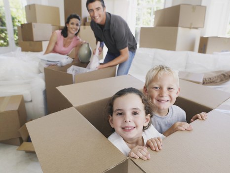 Moving team assisting with a home move in Brondesbury street setting