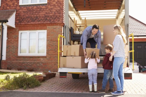 Packed boxes and wrapped household items prepared for removal