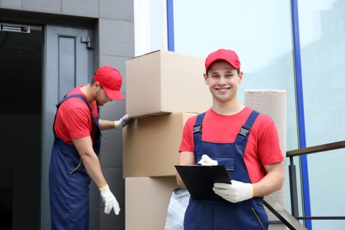 Man with van moving boxes during a booking service