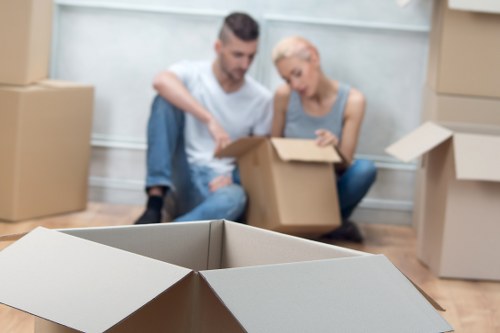 Professional mover loading furniture into a van
