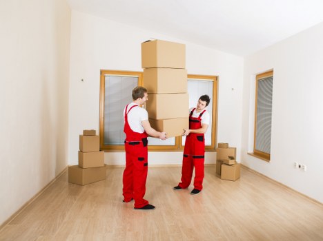 Careful transport of boxed belongings for a local Brondesbury move