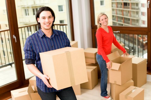 Brondesbury moving team using safe handling practices during a relocation